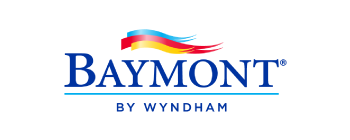 Baymont by Wyndham logo, featuring 3 flag graphics blowing in the wind: red, yellow, and blue.